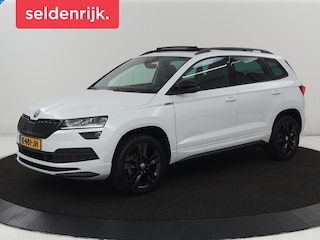 Skoda Karoq 1.5 TSI Sportline | Panoramadak | Stoelverwarming | Adaptive cruise | Camera | Sportstoelen | Virtual Cockpit | Navigatie | Sfeerverlichting | Full LED | 18'' | Keyless | Climate control