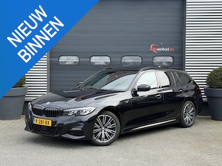 BMW 3-serie Touring 320i High Executive M-Sport | Panoramadak | Camera | Head-Up Display | DAB | Stoelverwarming | Elektrische Achterklep |