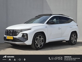 Hyundai Tucson 1.6 T-GDI PHEV N Line Sky 4WD automaat / Dealer onderhouden / Fabrieksgarantie tot 02-2027 / Glazen schuif- en kanteldak / Trekgewicht 1350 kg / EAER bereik 62 km bereik stad 74 km / Elektrische achterklep / Stuur- Stoel & Achterbankverwarming / Stoelventilatie /