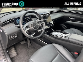 Hyundai Tucson 1.6 T-GDI PHEV Premium 4WD | Lederen bekleding | Stoel- en stuurverwarming | 4WD | Navigatiesysteem | Climate Control | Adaptieve Cruise Control | Plug In hybride | Full options | Resterende fabrieksgarantie | Rijklaarprijs |