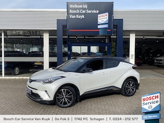 Toyota C-HR 1.8 Hybrid Bi-Tone / Automaat / Adaptieve Cruise-Control / Stoelverwarming / JBL-Audio / Dodehoek-Detectie / Afneembare-Trekhaak / Keyless / Climate-Control / Radio-Bluetooth / Navi / Camera / PDC V+A / 18'' LMV / All-Season / ENZ.
