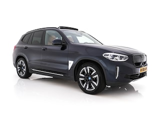 BMW iX3 High Executive 80 kWh [ 3-Fase -11kW] {SOH-98%} (INCL-BTW) Aut. *PANO | LEATHER | HARMAN/KARDON | FULL-LED | BLINDSPOT | MEMORY-PACK | DIGI-COCKPIT | HEATED-SPORTSEATS | KEYLESS | TOPVIEW | DAB+ | NAVI-FULLMAP | HEAD-UP | ...