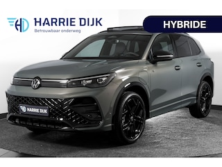 Volkswagen Tiguan 1.5 eHybrid R-Line Edition 272 PK | Black Style | 15 inch Navi | Elek. Trekhaak | IQ Light | S/K-Panodak | Dig. Cockpit | Adapt. Cruise | Stoel-+Stuurverw. | 360 Camera | NAV + App. Connect | ECC | Elek. Klep | LM 20" | 8590