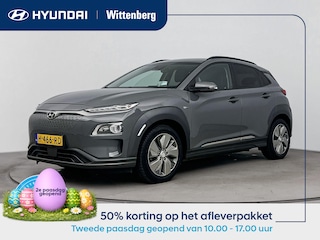 Hyundai Kona EV PREMIUM 64 kWh <| SoH 96%! | TREKHAAK | 3 FASE | WARMTEPOMP | LEDER | CLIMA | CRUISE ADAPTIEF | CAMERA | NAVI | STOEL- & STUURVERWARMING | 17'' LM VELGEN | PDC VOOR & ACHTER |