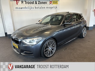 BMW M135i xDrive High Executive 6 Cilinder | Panoramadak | Harman/Kardon | Lederen bekleding | Memory seats | Achteruitrijcamera | M Sport stuur | Adaptief onderstel | Cruise control | Climate control | Stoelverwarming