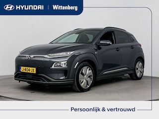 Hyundai Kona EV PREMIUM 64 kWh | 3 FASE | WARMTEPOMP | LEDER | CLIMA | CRUISE ADAPTIEF | CAMERA | NAVI | STOEL- & STUURVERWARMING | 17'' LM VELGEN | PDC VOOR & ACHTER |