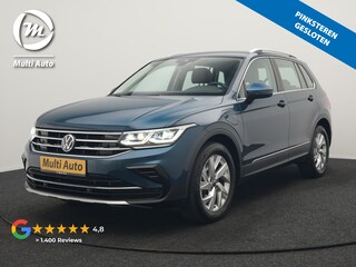 Volkswagen Tiguan 1.4 TSI eHybrid Elegance PHEV 245pk Dealer O.H. | Trekhaak Af Fabriek | Adaptive Cruise | IQ Light | Camera | Lederen Comfortzetels Memory & Verwarmd | Sfeerverlichting | Apple Carplay | Stuur Verwarmd | Navigatie | DAB | Plug In Hybrid |