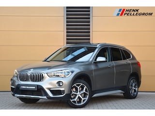 BMW X1 sDrive20i Orange Edition II * Sportstoelen * Panoramadak * Head-up * Trekhaak *