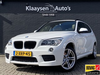 BMW X1 sDrive20i High Executive 184 pk AUT. | panoramadak | navigatie | trekhaak | beige leder interieur | sportstoelen