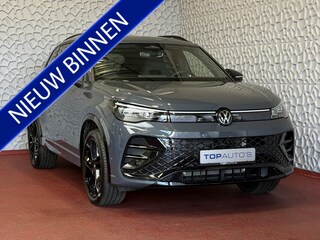 Volkswagen Tiguan 1.5 eHYBRID 272 PK NW AUTO R-LINE VW.TREKHAAK BLACK PANO XL.NAVI STOEL/STUUR VERW. BLACK.STYLE 360.CAM ELEK.KLEP MATRIX.LED 20''LMV MASSAGE SCHUIFDAK PHEV PLUG IN HYBRID ✅Top Auto's Wijchen , 30 Jaar Specialist in Volkswagen  : Alle Type's : R-Line Edition / Style / First Edition / Highline / Life , Zowel PHEV / HEV / MHEV / Benzine ✅