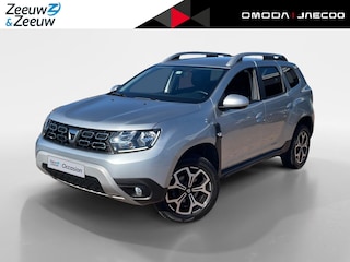 Dacia Duster 1.3 TCe Prestige *Navi+Camera*Climate Control*Trekhaak*Lederen bekleding*Parkeersensoren*Dode hoek detectie*Zeer nette auto!