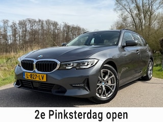 BMW 3-serie Touring 330i High Executive / Automaat / Stoelverwarming / Navigatie / Half Leder / Goed onderhouden /