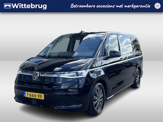 Volkswagen Multivan 1.4 eHybrid L2H1 Style / 7 PERS./ AUTOMAAT/ TREKHAAK/ LEER/ HARMAN&KARDON/ CLIMA/ APP-CONNECT/ NAVI/ CRUISE/ STOELVERWARM./ DIGITAL DASH/ PARK. SENSOREN + CAMERA