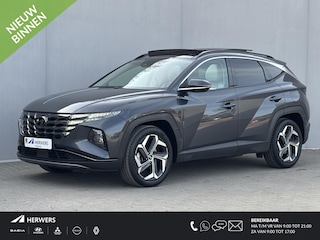 Hyundai Tucson 1.6 T-GDI HEV 230pk Premium Sky / Dealer onderhouden / Glazen schuif- en kanteldak / Trekgewicht 1650 kg / Elektrische achterklep / Stuur- Stoel & Achterbank verwarming / Rondomzicht camera / Stoelventilatie / Adaptief cruise control / Krell Audio Systeem /