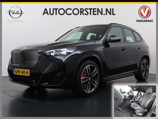 BMW iX1 eDrive20 67kWh M-Sport-Pro Leder/Alcantara Premium 19" LED Connected-Pro Warmtepomp Camera Navi Ecc Pdc 100% SOH Apple Carplay Android Auto Stoelverwarming Adap.demping Standverwarming/koeling Zwarte-Hemel Drive-Assist Elek.Achterklep Lmv Led Isofix DAB Keyless Wifi 1e Eigenaar Origineel Nederlandse Auto Zeer compleet!