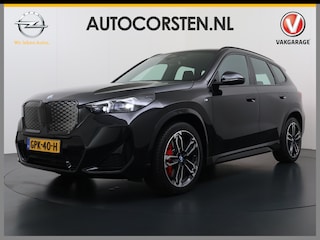 BMW iX1 eDrive20 67kWh M-Sport-Pro Leder/Alcantara Premium 19" LED Connected-Pro Warmtepomp Camera Navi Ecc Pdc 100% SOH Apple Carplay Android Auto Stoelverwarming Adap.demping Standverwarming/koeling Zwarte-Hemel Drive-Assist Elek.Achterklep Lmv Led Isofix DAB Keyless Wifi 1e Eigenaar Origineel Nederlandse Auto Zeer compleet!