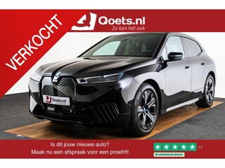 BMW iX xDrive40 High Executive 77 kWh Sportpakket - Trekhaak - Panoramadak - Multifunctionele stoelen voor - Comfort Access - Driving/Parking Assistant Professional - Harman kardon - BMW Laserlight -