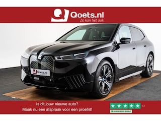 BMW iX xDrive40 High Executive 77 kWh Sportpakket - Trekhaak - Panoramadak - Multifunctionele stoelen voor - Comfort Access - Driving/Parking Assistant Professional - Harman kardon - BMW Laserlight -