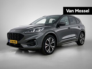 Ford Kuga 2.5 PHEV Vignale | Adaptive Cruise Control | Achteruitrijcamera met Park Assist | Alcantara | All Seasonbanden | Apple Carplay/Android Auto | B&O Audio | Blind Spot Warning | Elektrische Achterklep | Elektrisch Verstelbare Bestuurdersstoel | Head-Up Display | Keyless | Stoel- Stuur- Voorruit- en Achterbankverwarming |