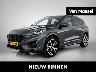 Ford Kuga 2.5 PHEV Vignale | Adaptive Cruise Control | Achteruitrijcamera met Park Assist | Alcantara | All Seasonbanden | Apple Carplay/Android Auto | B&O Audio | Blind Spot Warning | Elektrische Achterklep | Elektrisch Verstelbare Bestuurdersstoel | Head-Up Display | Keyless | Stoel- Stuur- Voorruit- en Achterbankverwarming |