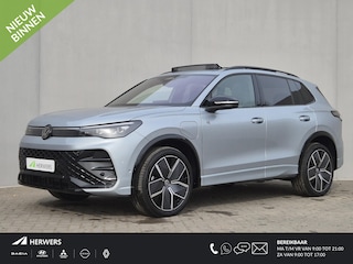 Volkswagen Tiguan 1.5 eHybrid R-Line Business / Fabrieksgarantie tot 12-2027 / Trekhaak / CCS snellader / Head Up Display / Trekgewicht 2000 kg / Glazen schuif- en kanteldak / Voorstoel met massage functie / Stuur- Stoel & Achterbank verwarming / Elektrische achterklep / Achteruitrijcamera /