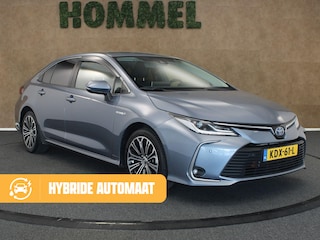 Toyota Corolla 1.8 Hybrid Active - AFNEEMBARE TREKHAAK - TREKGEWICHT 750 KG - NAVIGATIE - CLIMATE CONTROL - 17 INCH LICHT METALEN VELGEN - KEYLESS ENTRY/ START- CAMERA - ADAPTIEVE CRUISE CONTROL - LENDESTEUN VERSTELLING BESTUURDERSSTOEL - PARKEERSENSOREN VOOR/ ACHTER - VOLLEDIG DEALER ONDERHOUDEN