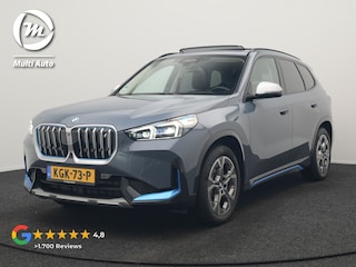 BMW iX1 xDrive30 Launch Edition 313pk Dealer O.H | Panodak | Adaptive Cruise | 360 Camera | Lederen Comfortzetels Massage & Memory | Head Up | Harman Kardon | Keyless |