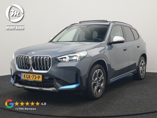 BMW iX1 xDrive30 Launch Edition 313pk Dealer O.H | Panodak | Adaptive Cruise | 360 Camera | Lederen Comfortzetels Massage & Memory | Head Up | Harman Kardon | Keyless |