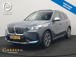 BMW iX1 xDrive30 Launch Edition 313pk Dealer O.H | Panodak | Adaptive Cruise | 360 Camera | Lederen Comfortzetels Massage & Memory | Head Up | Harman Kardon | Keyless |