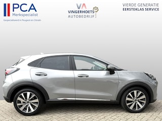 Ford Puma 125 Pk Titanium X Benzine * Navigatie * Adaptive Cruise Control * Achteruitrij Camera * 18" L.M. Velgen * Vingerhoets; Vierde Generatie Eersteklas Service. Al meer dan 100 jaar een begrip in de Brabantse Kempen.
