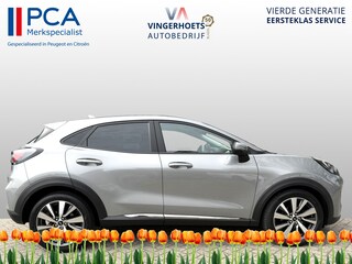 Ford Puma 125 Pk Titanium X Benzine * Navigatie * Adaptive Cruise Control * Achteruitrij Camera * 18" L.M. Velgen * Vingerhoets; Vierde Generatie Eersteklas Service. Al meer dan 100 jaar een begrip in de Brabantse Kempen.