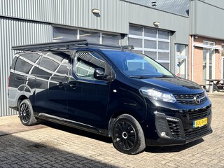 Opel Vivaro 2.0 CDTI L2H1 Dubbele schuifdeur Parkeerhulp voor en achter Achteruitrijcamera Airco Cruise control Kastinrichting Imperiaal Apple Carplay Bluetooth telefoon voorbereiding 3-Persoons Euro 6
