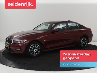 BMW 330e Business Edition Plus | Sportstoelen | Leder | Adaptive cruise | Stoelverwarming | Carplay | Stuurverwarming | Navigatie | Parkeerhulp | Full LED | Live Cockpit | Individual Aventurinrot metallic | PHEV | Plug In