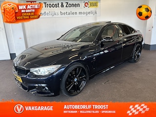 BMW 420i Centennial High Executive M Sport | Panoramadak | Lederen bekleding | Head up display | Cruise control | Climate control | Lane assist | Nederlands geleverd | Achteruitrijcamera | Adaptief onderstel | Stoelverwarming | Elek. kofferklep | Elek. inklap