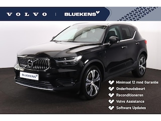 Volvo XC40 T4 Recharge Inscription - IntelliSafe Assist - Parkeercamera achter - Verwarmde voorstoelen & stuur - Parkeersensoren voor & achter - Draadloze tel. lader - Extra getint glas - Elektr. inklapbare trekhaak - 19' LMV