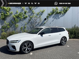 Volvo V60 Plug-in Hybrid T8 AWD R-Design | Bowers & Wilkins audio | FOUR-C actief onderstel | Trekhaak | 360 camera | Adaptive cruise control | Gelamineerde zijruiten | Stoel- en stuurverwarming | Verwarmbare achterbank | Actieve LED koplampen | Standkachel | Verwarmbare voorruit | Navigatie | Apple Carplay / Android Auto |