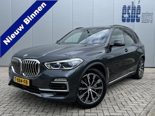 BMW X5 xDrive30d High Executive X-Line Luchtvering Tartufo Individual leder Trekhaak 3500 kg Panoramadak Laser Koplampen Head-Up Display Harman Kardon Audio Rondzicht Camera Vol Opties Lage Kilometerstand