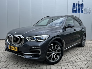 BMW X5 xDrive30d High Executive X-Line Luchtvering Tartufo Individual leder Trekhaak 3500 kg Panoramadak Laser Koplampen Head-Up Display Harman Kardon Audio Rondzicht Camera Vol Opties Lage Kilometerstand