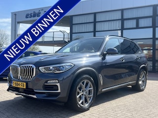 BMW X5 xDrive30d High Executive X-Line Luchtvering Tartufo Individual leder Trekhaak 3500 kg Panoramadak Laser Koplampen Head-Up Display Harman Kardon Audio Rondzicht Camera Vol Opties Lage Kilometerstand