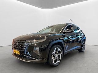 Hyundai Tucson 1.6 T-GDI 265pk PHEV Premium 4WD (299,- p/m Demo Deal!) | Leder | Carplay | Climate | Keyless | Navigatie | Elek. Klep | Full - Led | 360 Camera | KRELL Audio | Elek. Stoelen | 19" Lichtmetaal | Winterpakket | Stoelventilatie