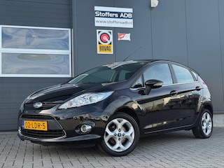 Ford Fiesta 1.25 Titanium 82pk | 100% Ford dealer onderhouden | Cruise | Climate control | Bluetooth | PDC | 5-deurs | Lichtmetaal