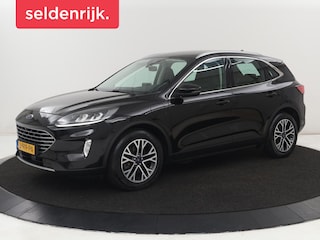 Ford Kuga 2.5 PHEV Titanium | SOH 91,5% | Trekhaak | Stoelverwarming | Adaptive cruise | Camera | Caplay | Navigatie | Dodehoek detectie | Keyless | Digital Cockpit | Achterbankverwarming | Plug In