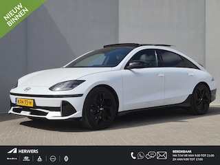 Hyundai Ioniq 6 First Edition AWD 77.4 kWh / SOH 100% / Fabrieksgarantie tot 02-2028 / Dealer onderhouden / CCS snelladen / WLTP bereik 519 km bereik stad 658 / Head Up Display / Trekgewicht 1.500 kg / Glazen schuif- en kanteldak / Stuur- Stoel & Achterbank verwarming / Bose Audio Systeem / Rondomzicht camera / Elektrische achterklep / Warmtepomp /