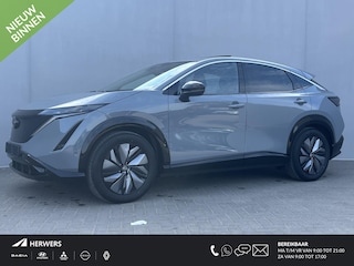 Nissan Ariya Evolve 91 kWh / Elektrische Schuif/Kantel Dak / Apple Carplay&Android Auto / Trekhaak (750 KG) / Adaptieve Cruise Control / 360 Camera / Alle Stoelen&Stuur Verwarming / Keyless Entry/Start / Elektrische Achterklep / Memory Seats /