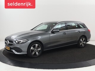 Mercedes-Benz C-klasse 300e Luxury Line | SOH 92% | Leder | Trekhaak | Stoelverwarming | Sfeerverlichting | Carplay | Full LED | Navigatie | Camera | Park Assist | Dodehoek detectie | PHEV | Plug In