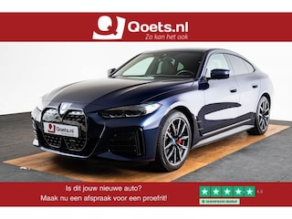 BMW i4 eDrive40 84 kWh M Sport pro - Active cruise control - Elektrisch verwarmde voorstoelen - Stuurwielrand verwarmd - Getinte ruiten - Comfort Access - Harman kardon - Ambiance verlichting -