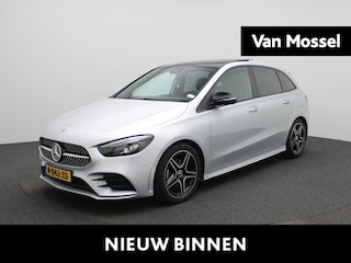Mercedes-Benz B-klasse 180 AMG Line | Automaat | Schuifdak | Sfeerverlichting | Stoelverwarming | Half Leder | Elektrische Kofferkelp |