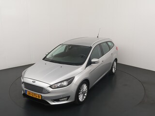 Ford Focus Wagon 125pk Titanium | Nwe. distributieriem | Trekhaak | Voorruit verwarmd | Camera | Clima | Cruise |