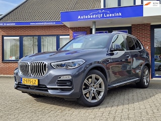 BMW X5 XDrive45e High Executive M H&K Panorama Laser El. Trekhaak HUD ACC Stuurverwarming Comfortstoelen Warmtecomfortpak. Keyless