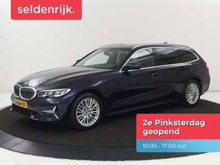 BMW 318i Luxury Line | Sportstoelen | Leder | Carplay | Live Cockpit | Sfeerverlichting | Trekhaak | Parkeerhulp | Climate control | Full LED | Cruise control | Bluetooth